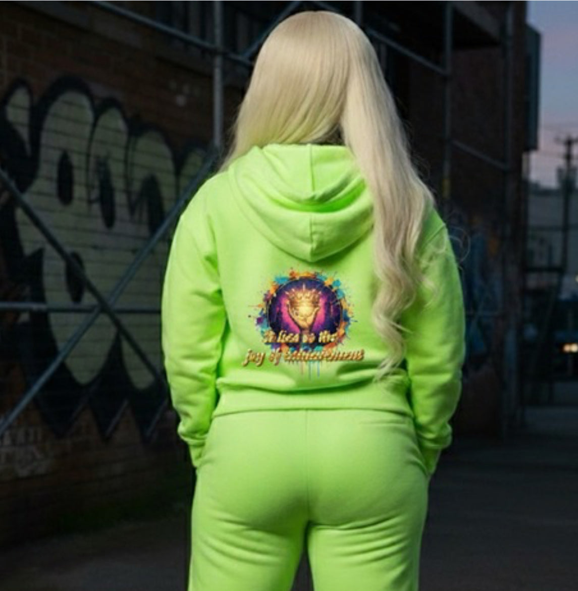 Joy of Achievement- HOODIE in neon green worn by a model showcasing trendy streetwear style.