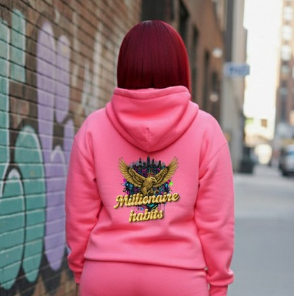 Millionaire Habits- HOODIE in pink with embroidered design, showcasing streetwear style and comfort.