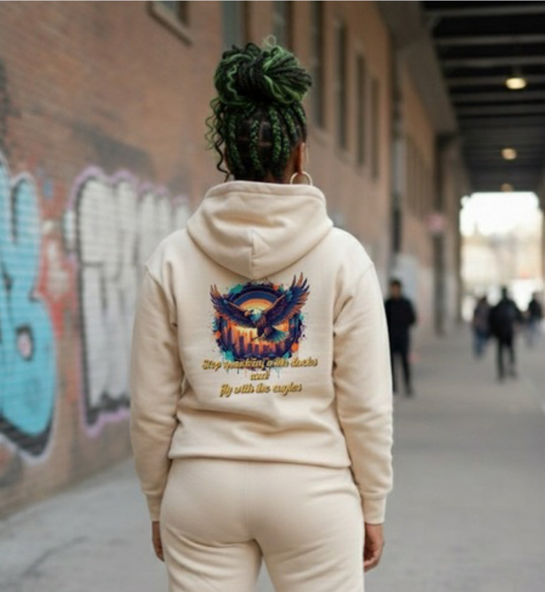 Fly With The Eagles- HOODIE showcasing streetwear style in urban setting, featuring vibrant eagle graphic on back.