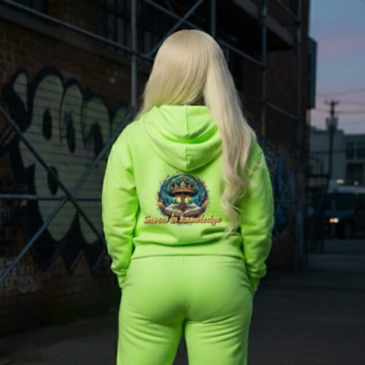 Invest In Knowledge- HOODIE worn by model in vibrant green, showcasing streetwear style and bold design.