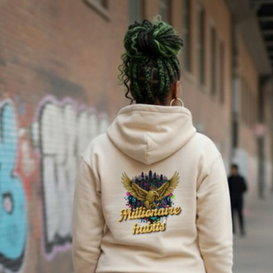 Millionaire Habits- HOODIE featuring a stylish design on the back, perfect for streetwear lovers.
