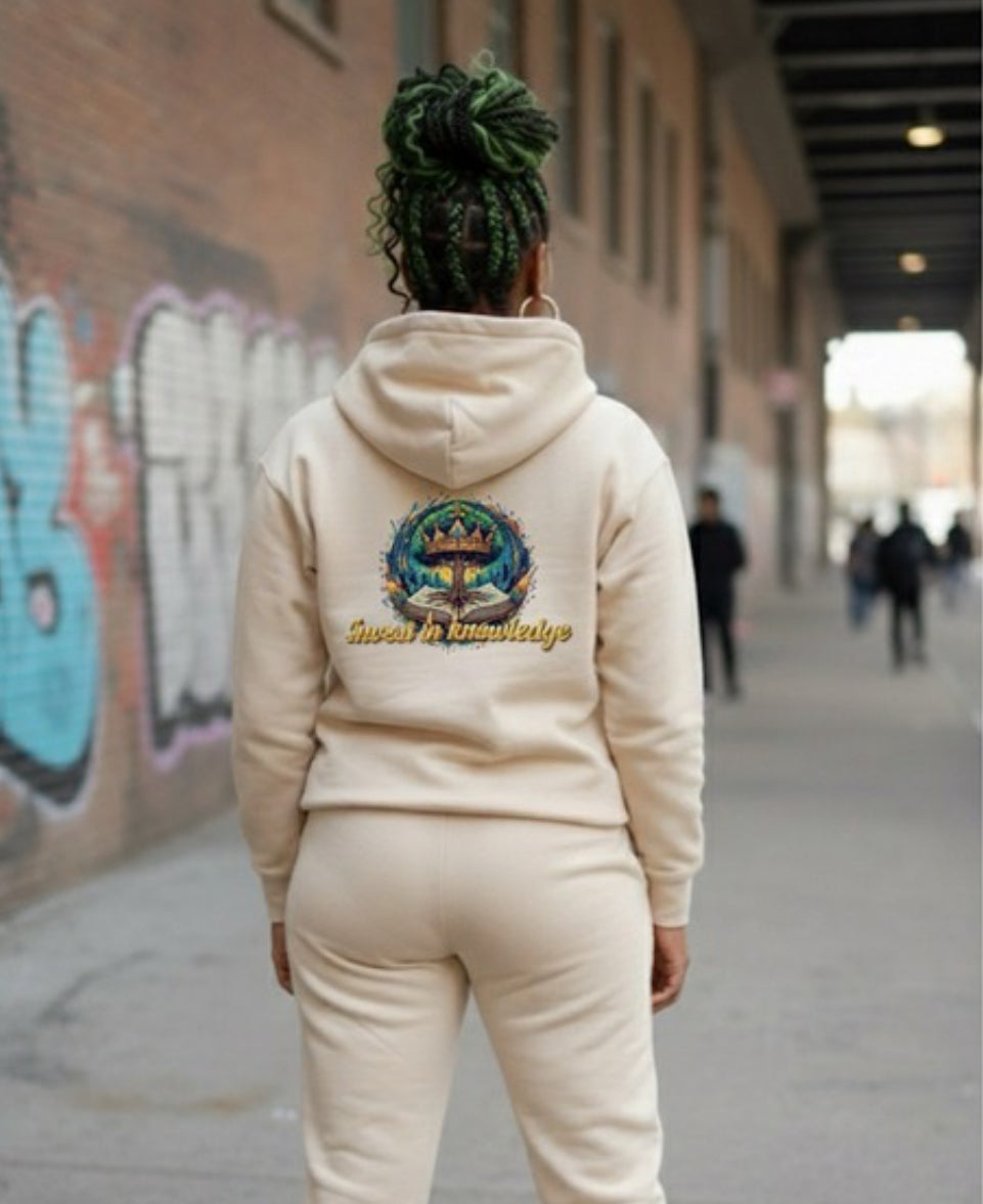 Invest In Knowledge- HOODIE seen from behind, worn with confidence in an urban setting.