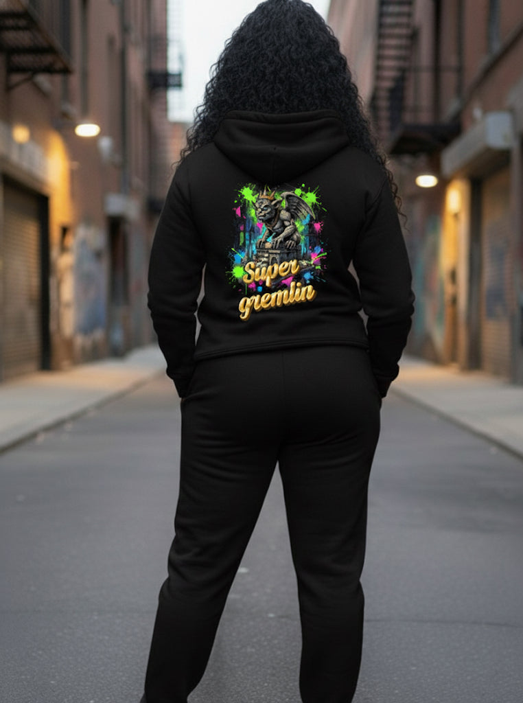 Woman wearing Super Gremlin- HOODIE in street setting showcasing vibrant back design.