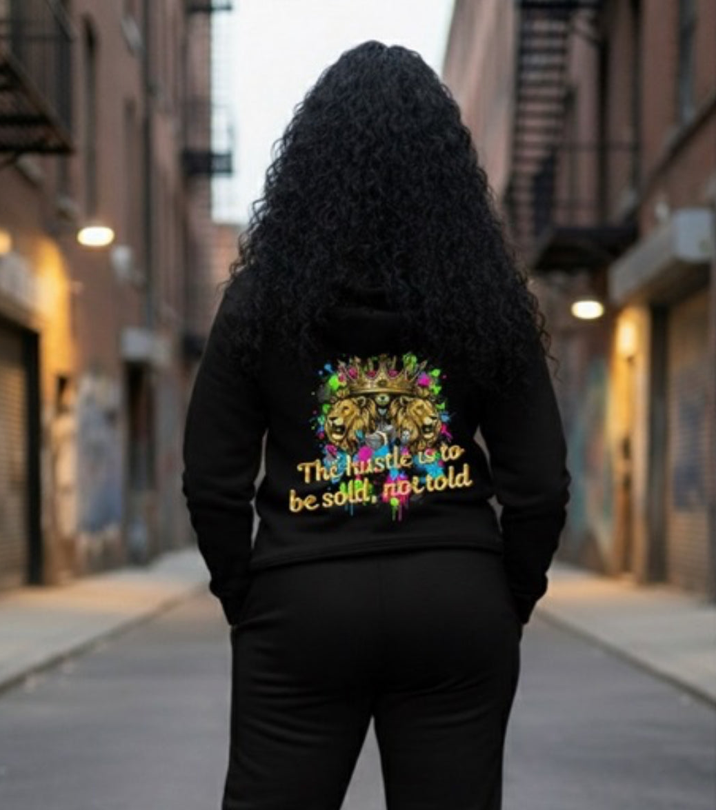 The Hustle Should Be Sold- HOODIE in streetwear style, showcasing vibrant back design in urban setting.